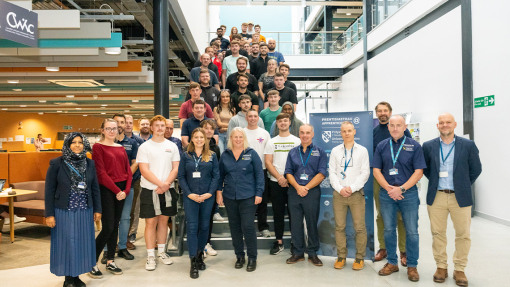 Apprentice staff and students posing for a photo