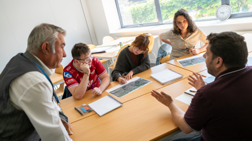 Image of students working on class project