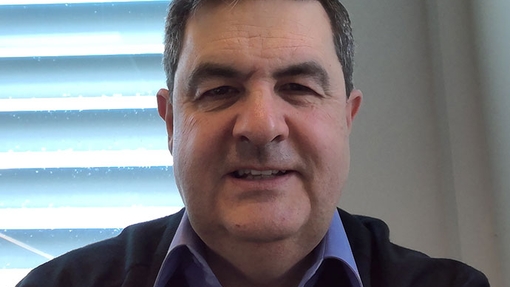 male staff portrait smiling