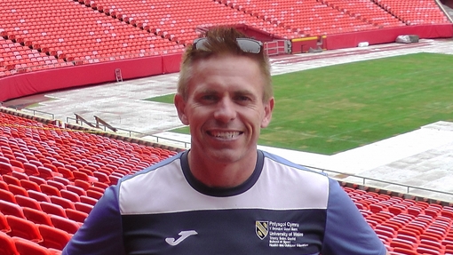 Andrew Thomas at a sports stadium