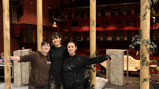 Students in front of garden gazebo model 