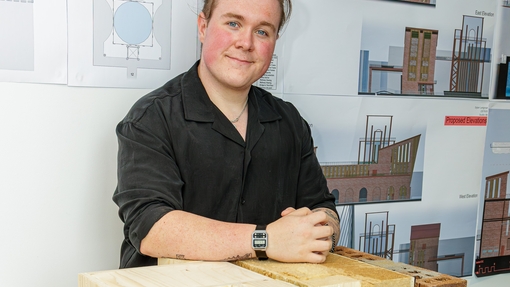 Dylan Longman with his work
