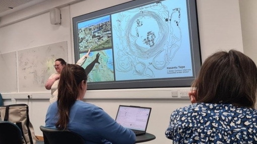 Natalie Boyd presenting during her time in New York in front of a classroom