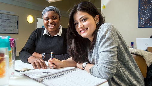Two Students Smiling