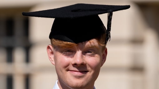 Aron Evans in his cap and gown 