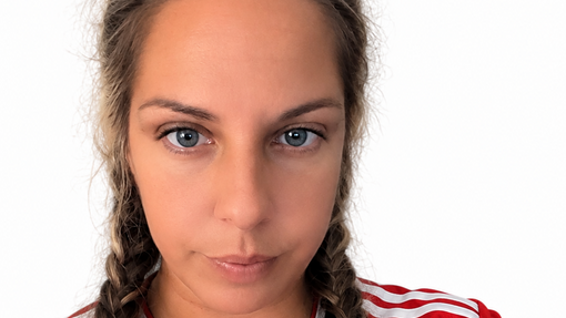 Headshot of Sarah Stanley wearing Wales football top