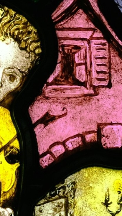 Bright stained glass image of man playing the fiddle. 