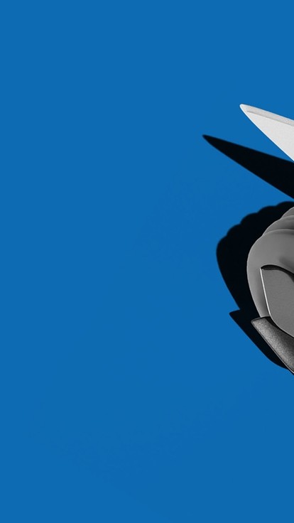 A digital design for a metallic vehicle with sharp spokes and large wheels in relation to the body size.