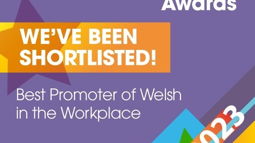 Poster with text: we've been shortlisted! Best promoter of Welsh in the workplace.