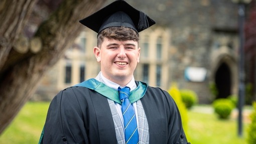 Student in cap and gown