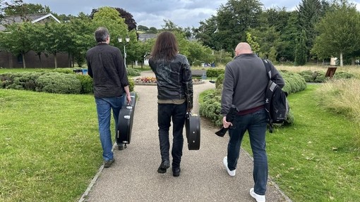 three men walking