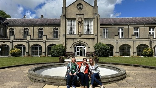 People in front of water fountain