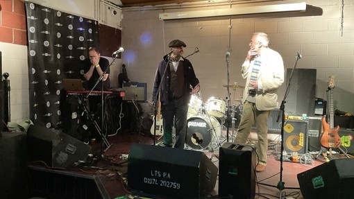 people on stage performing