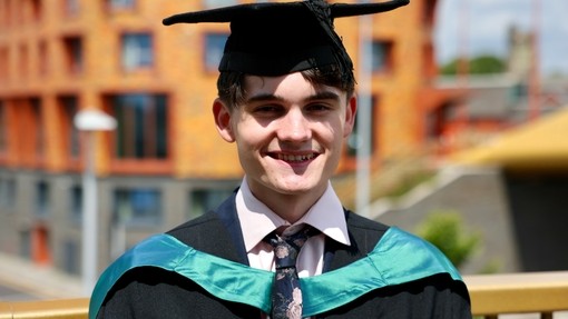 young man graduating