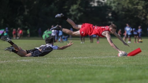 Remiel Wharton playing touch rugby for Wales in the World Cup 2024 and scores against Sinagpore. Picture credit sportphoto.wales