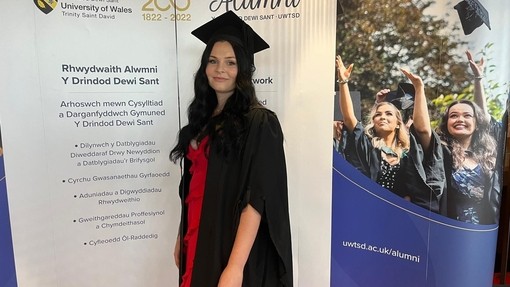 photo of student in cap and gown