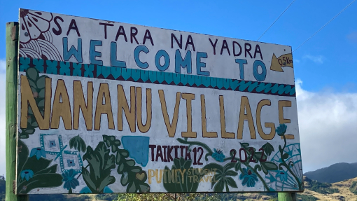 A signpost of Nananu Village