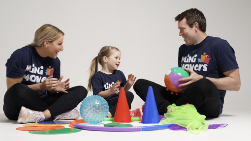 A family playing using the Mini Movers app