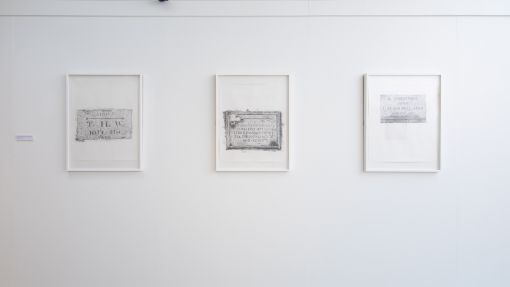 Alex's work being displayed on the wall