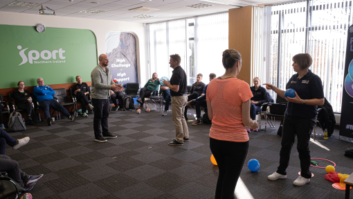 Nalda demonstrating a few exercise ideas with attendees
