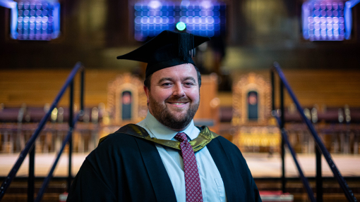 image of Matthew Rees in his cap and gown