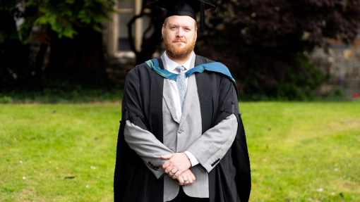 Image of Ricky Cooper in his cap and gown