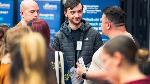 Students and graduates talking