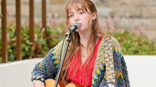 student playing music