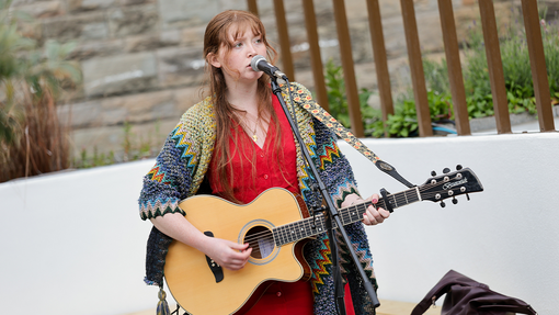 student playing music