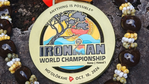 Medal that reads Ironman Championships Kona, Hawaii