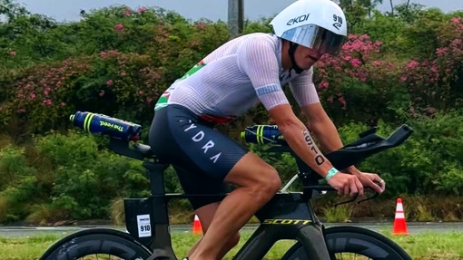 Guto Morgan on bike during Triathlon 