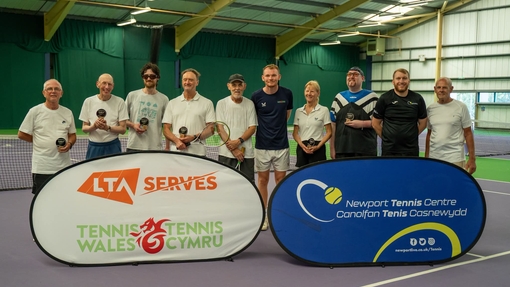 Tennis players posing for pictures
