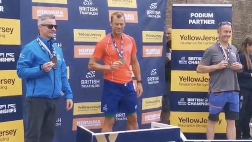 James Moore on the podium in position one in the British Championsips