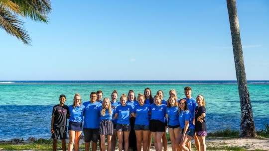 Image of student volunteers on a beach