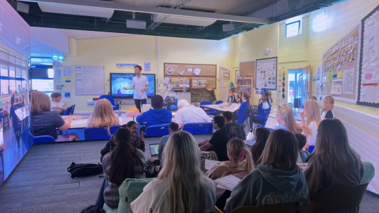 Students using the immersive room