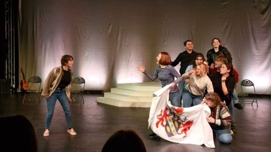 Grace acting in a play