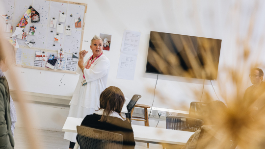 Image of woman looking towards the camera