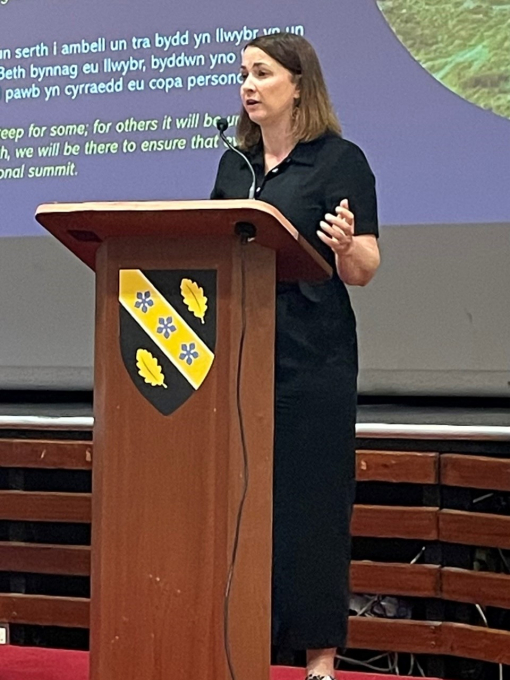 Rhonwen Morris speaking behind lectern