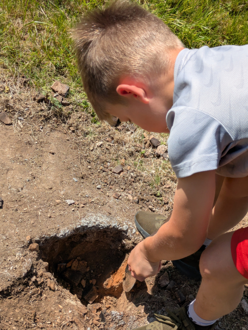 a child digging a hole