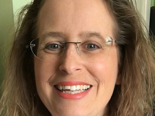 female staff profile smiling