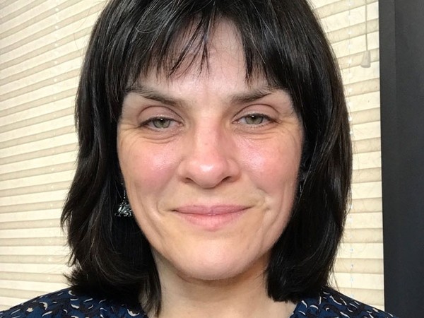 female staff profile smiling