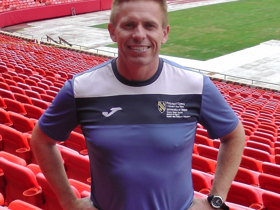 Andrew Thomas at a sports stadium