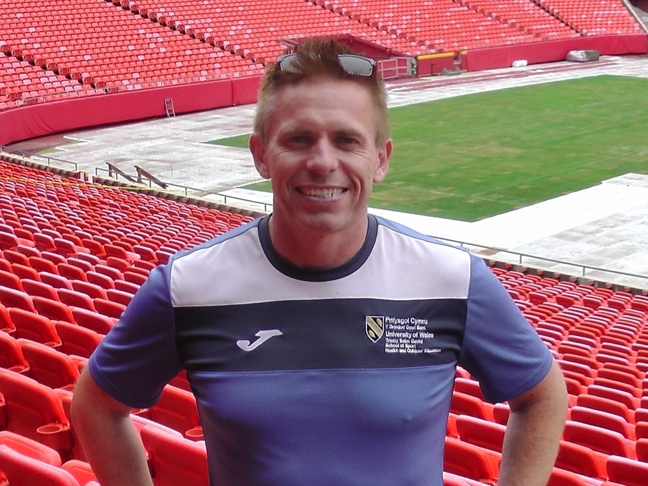 Andrew Thomas at a sports stadium