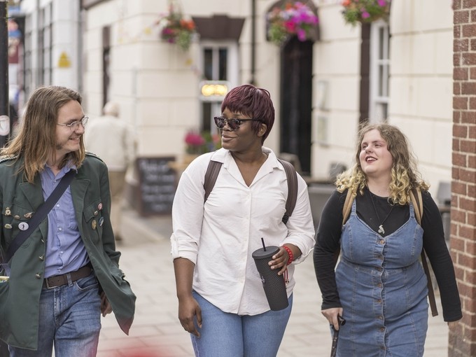Students walking through Lampeter town