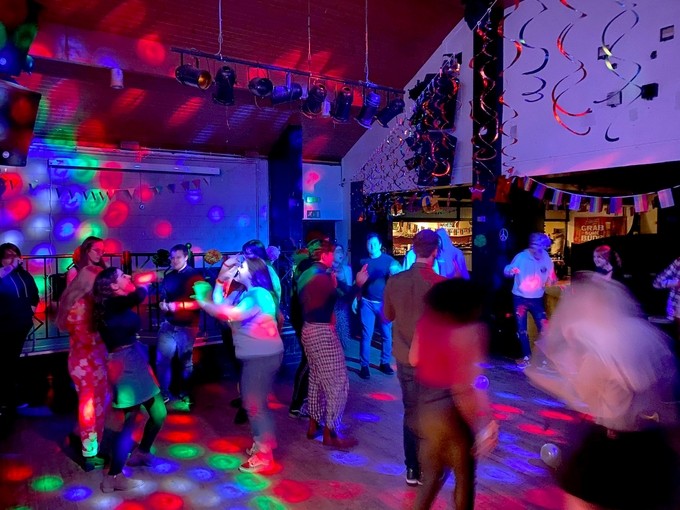 Images of students enjoying a disco