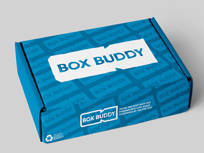 graphic design of a cardboard box with 'box buddy' written on it