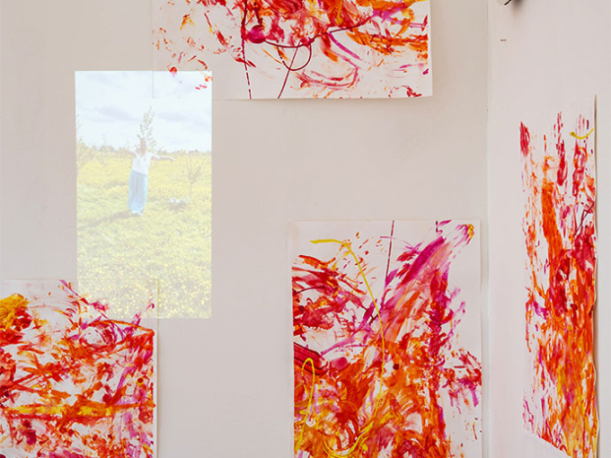 picture of a lady being projected by paint splats