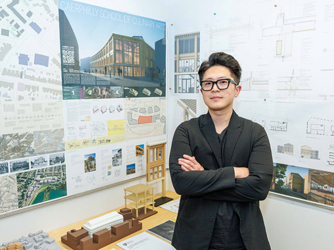 Jimmy Cho standing in front of Architecture Display