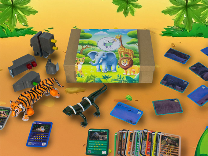 box with animals on and different game cards around it