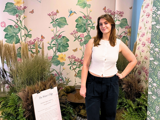 Anna Eynon with her textile display behind her